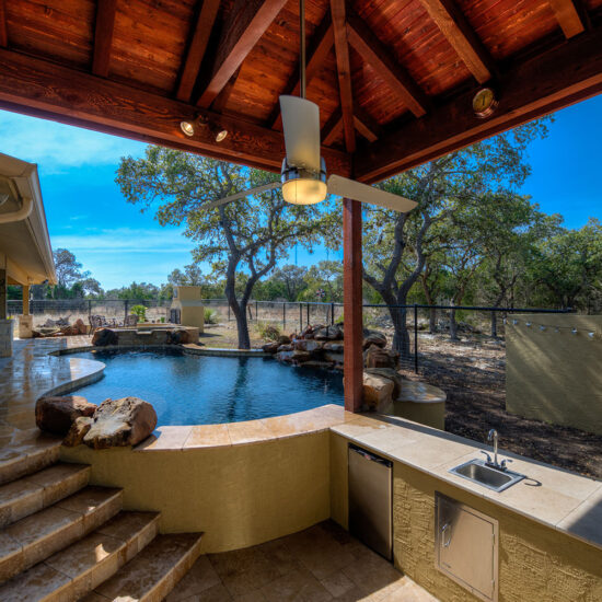 A sunken kitchen in this custom freeform pool.