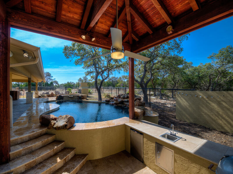 A sunken kitchen in this custom freeform pool.